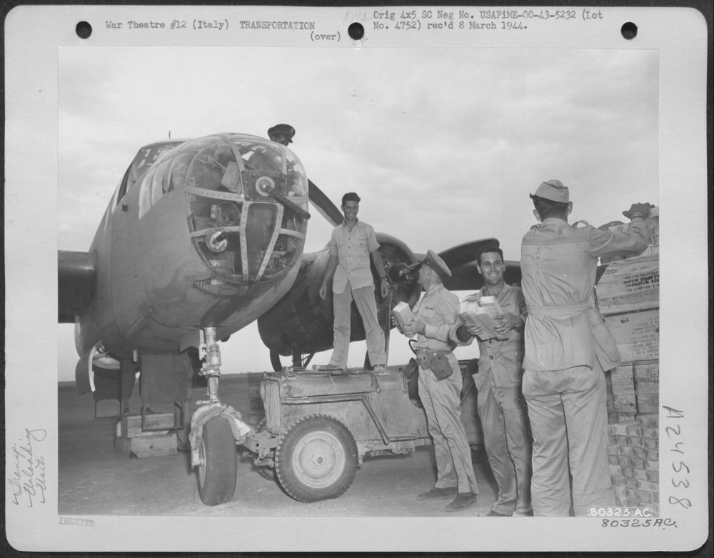 12th Bomb Group unloads B-25 in Italy