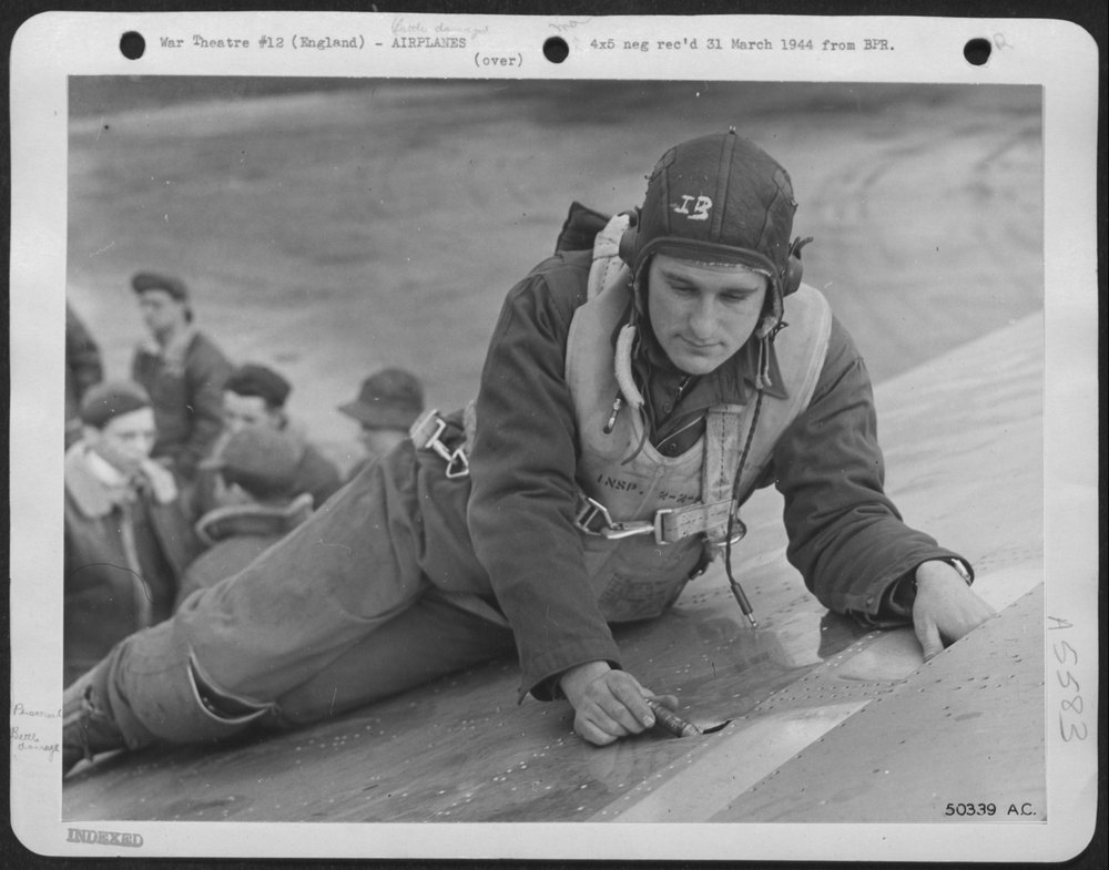 1st Lt. Earl E. Woodward, Navigator of New Silver Flying Fortress