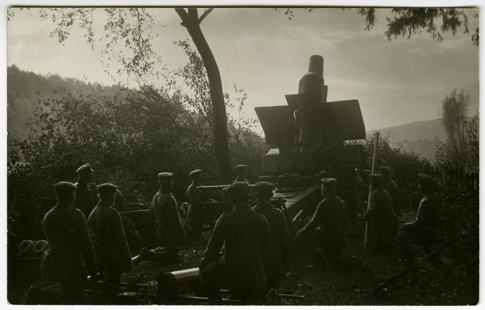 21 cm artillery piece in wooded area