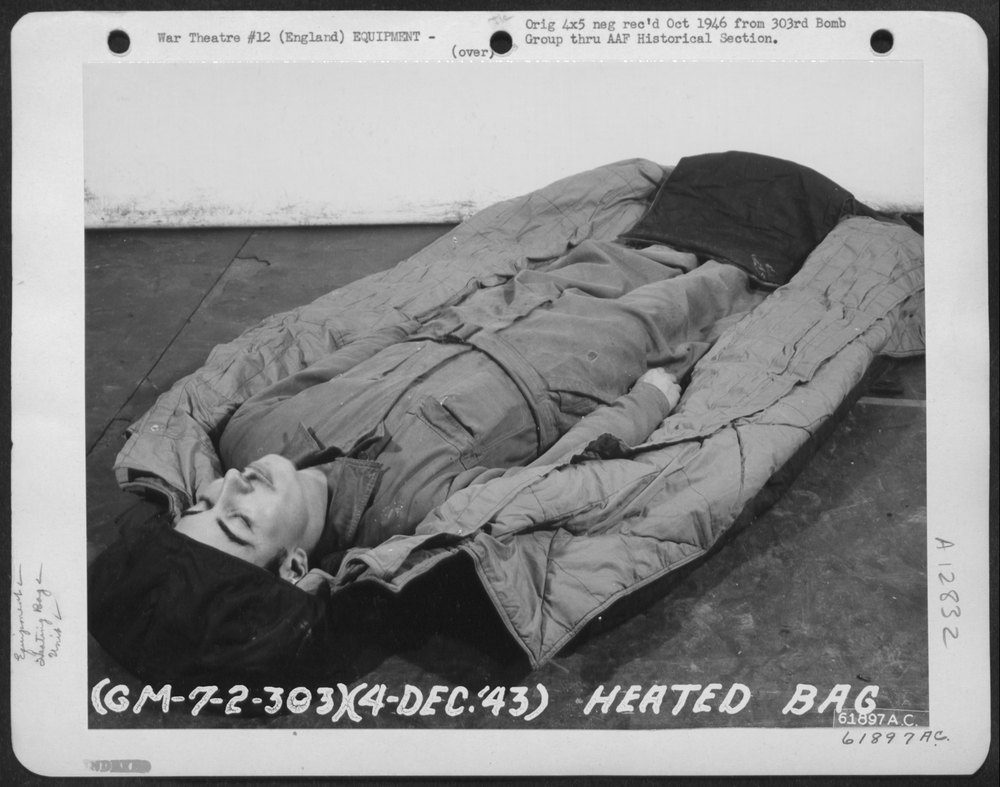 303rd Bomb Group crew member with heated bag
