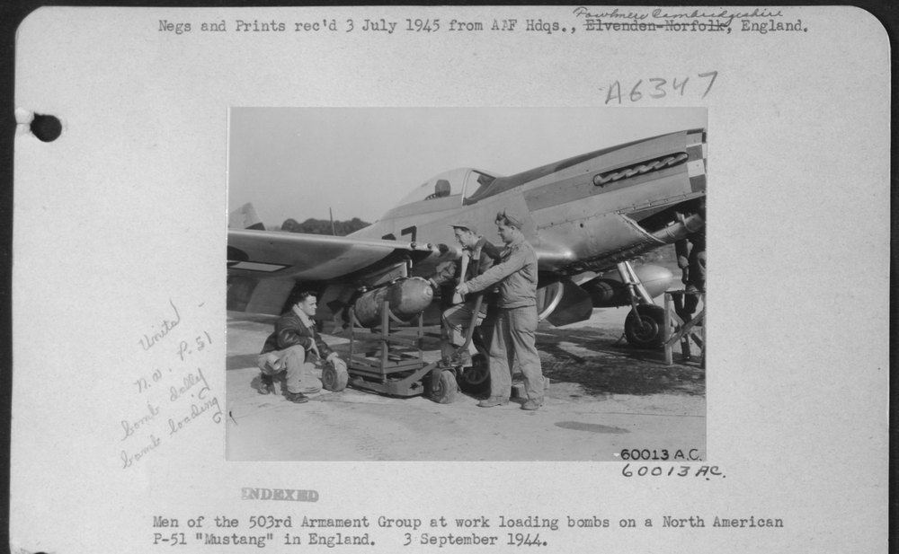 503rd Armament Group loading P51 Mustang in England