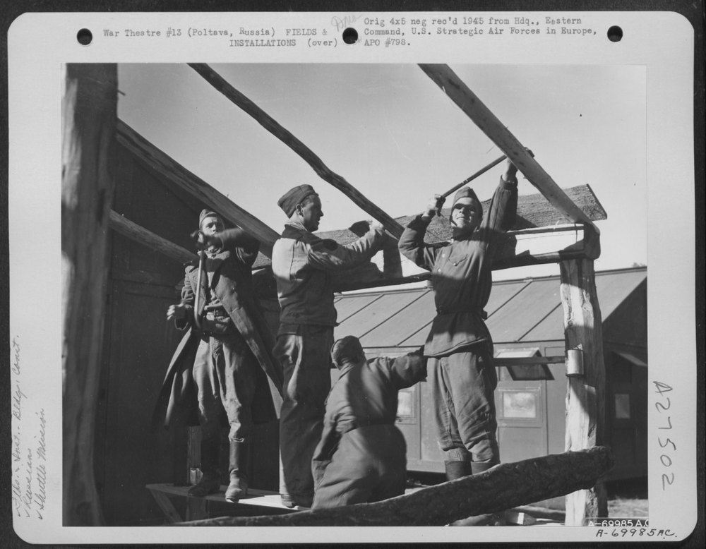 American GI's and Russian Soldiers Work Together in Construction