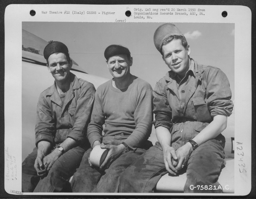 94th FS ground crew with P-80 in Italy
