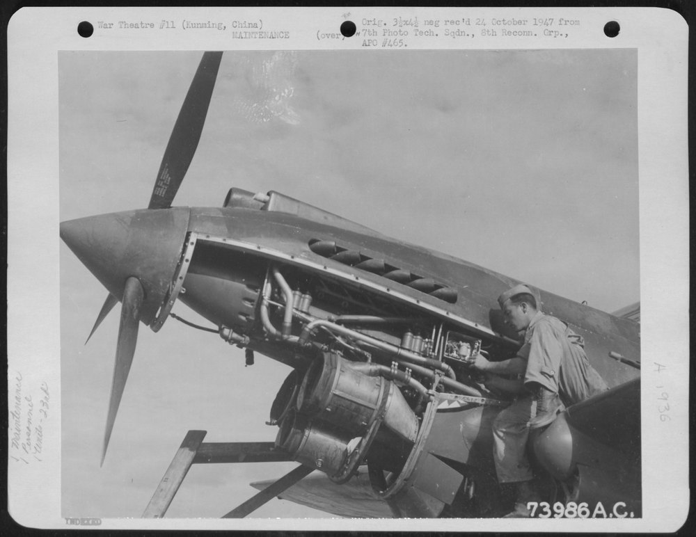 A Former American Volunteer Group Curtiss P-40 Is Overhauled By S/Sgt