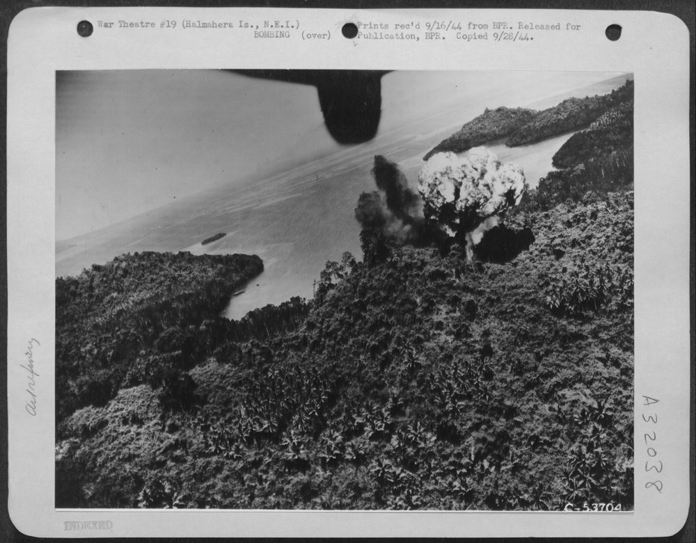 A ternate oil dump goes up in smoke after an attack by Mitchell