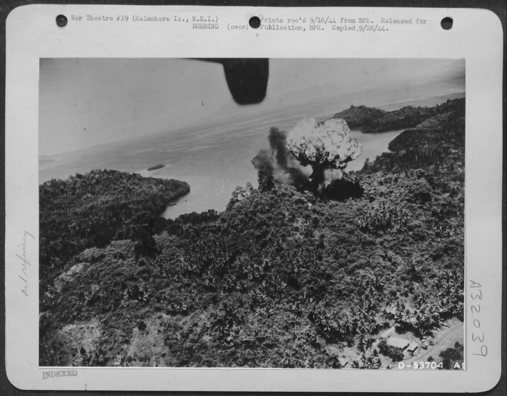 A ternate oil dump goes up in smoke after an attack by Mitchell