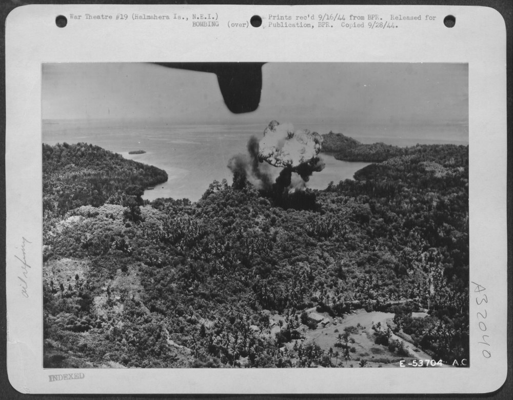 A ternate oil dump goes up in smoke after an attack by Mitchell