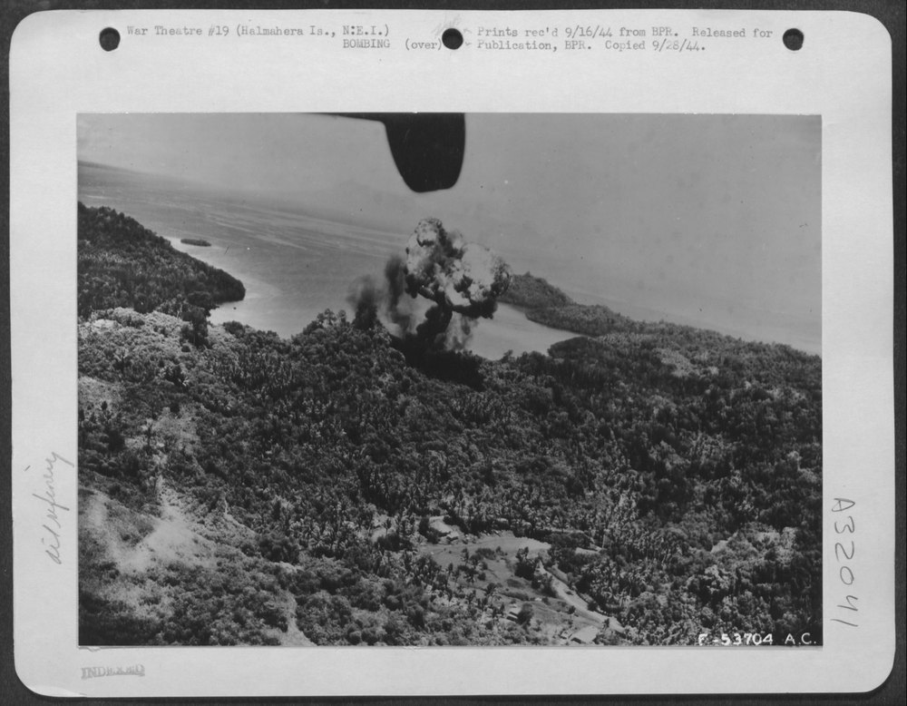 A ternate oil dump goes up in smoke after an attack by Mitchell