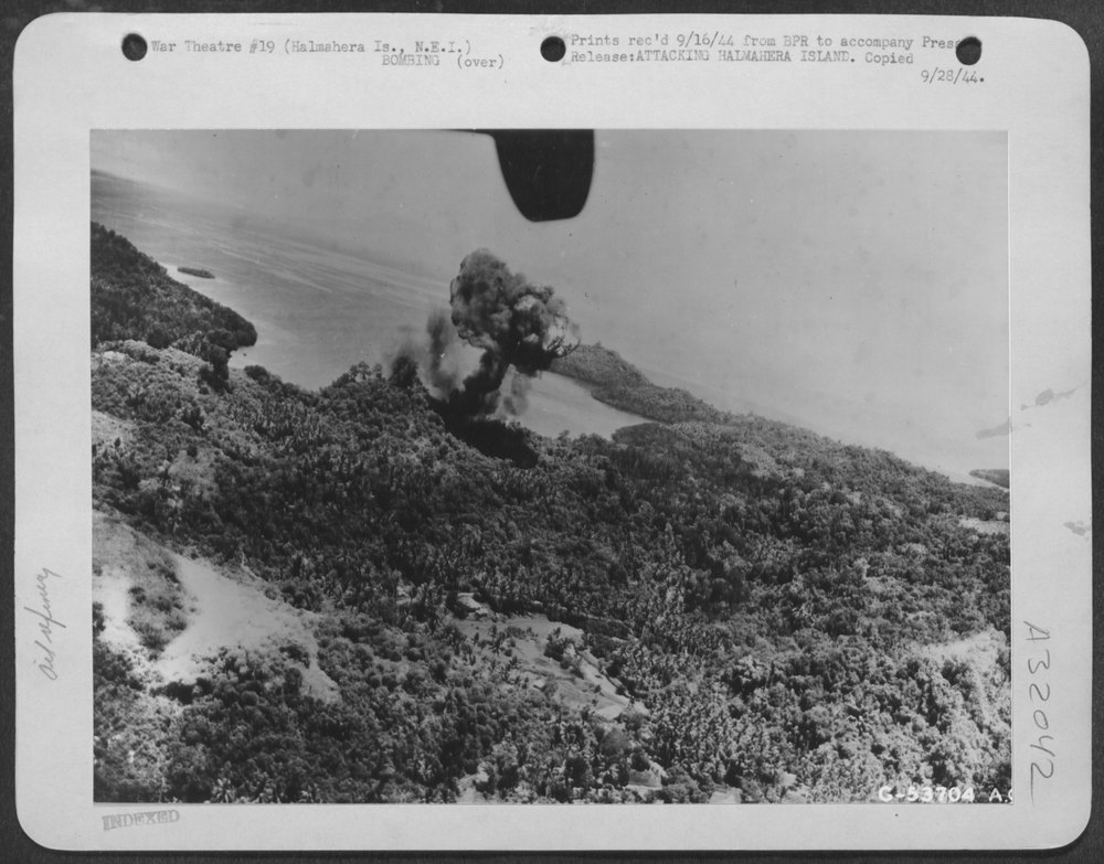 A ternate oil dump goes up in smoke after an attack by Mitchell