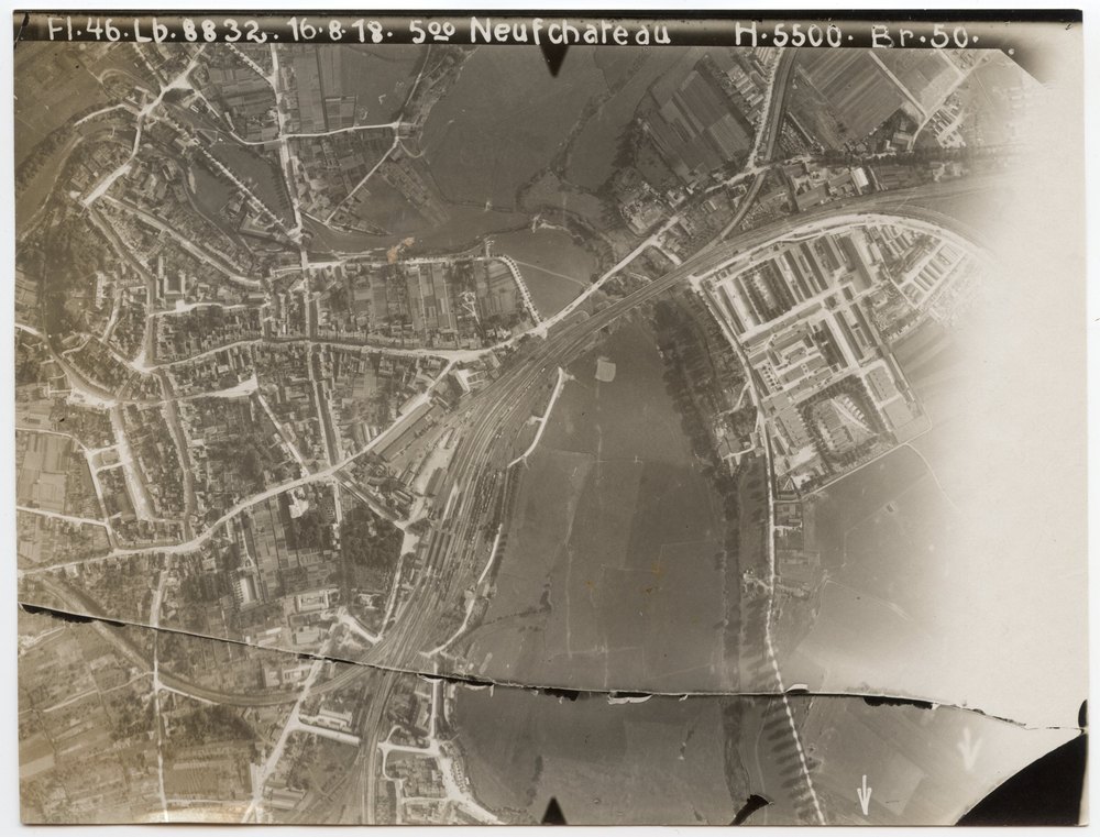 Aerial photograph of a town with railway yard