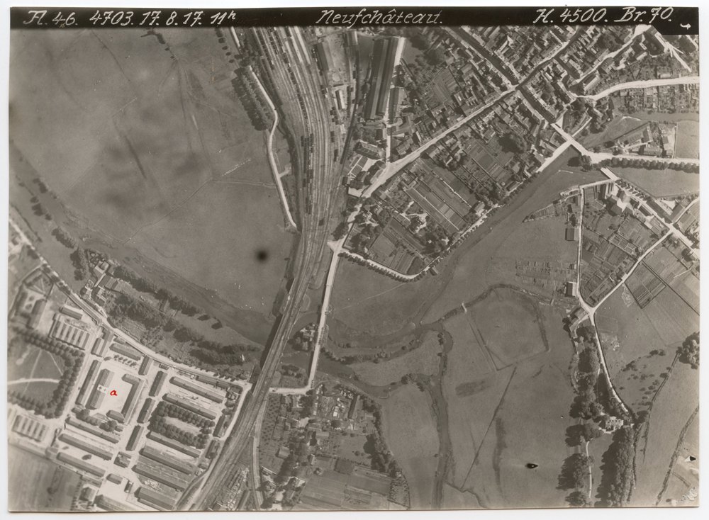 Aerial photograph of Neufchâteau with railway yard