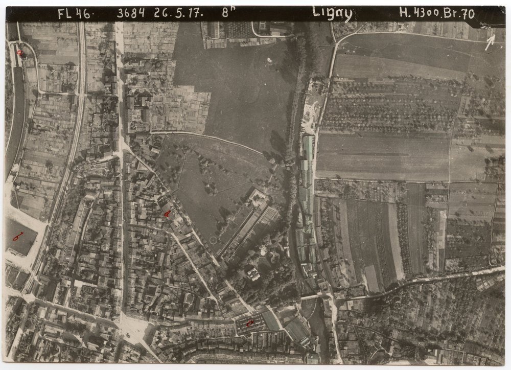 Aerial photograph of Signy with harbor and industrial area
