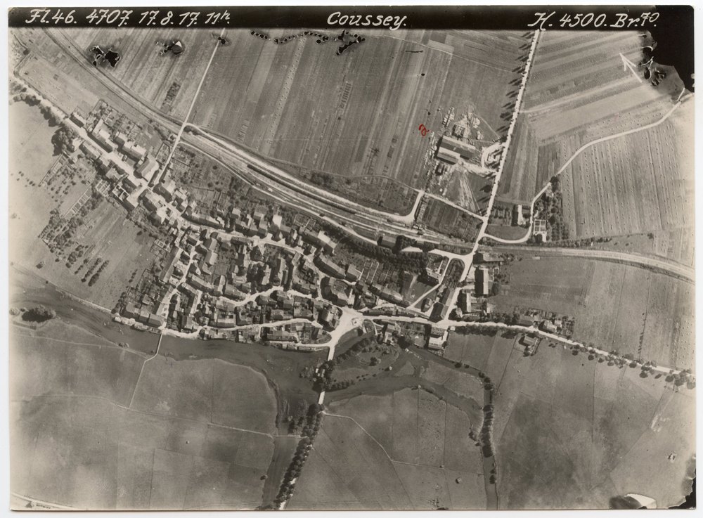 Aerial photograph of village and fields
