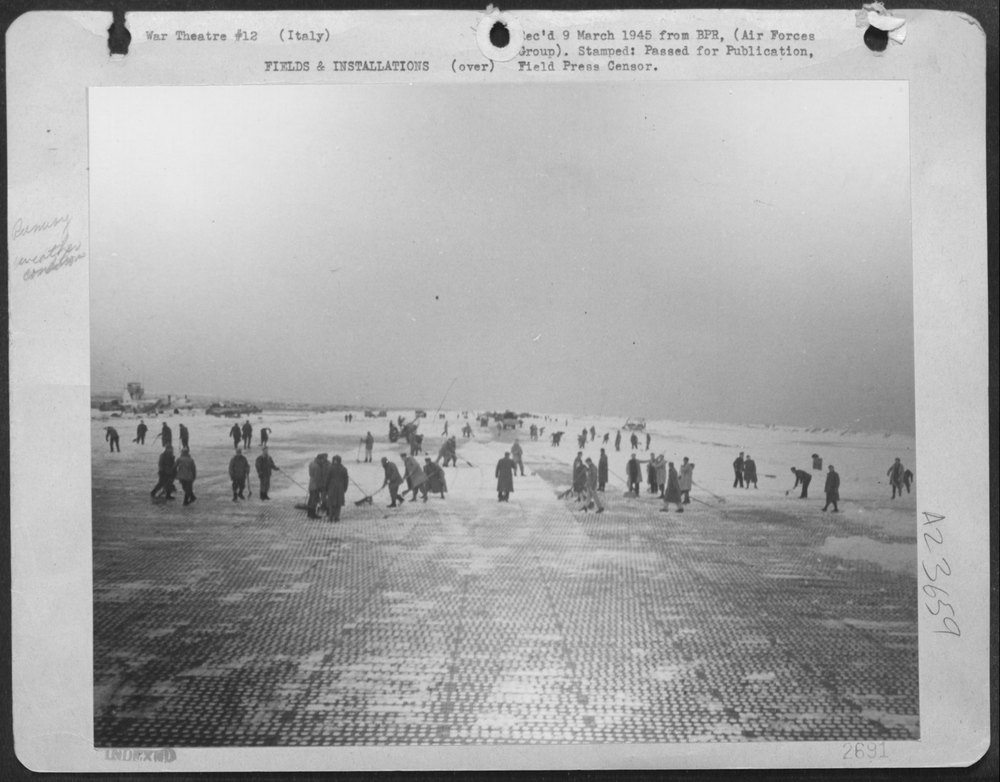 Airfield in Italy cleared after snowstorm