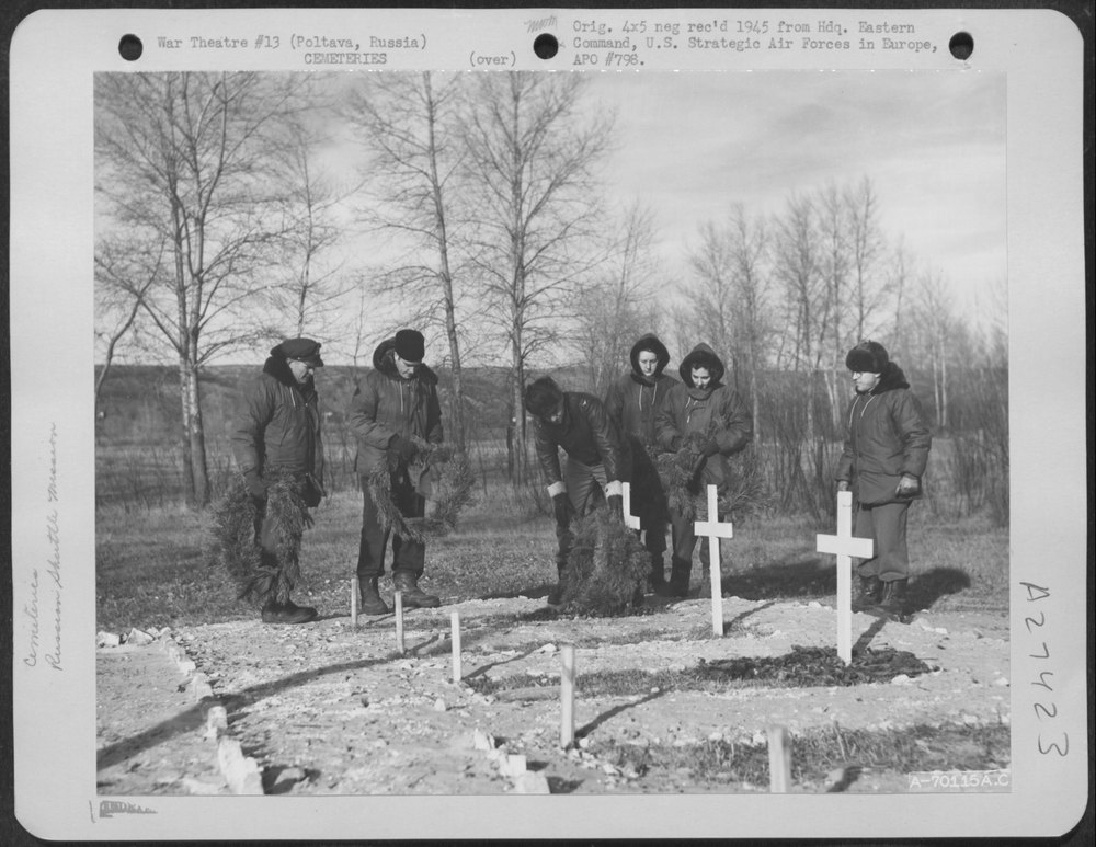 Airmen decorate graves near Poltava Airbase