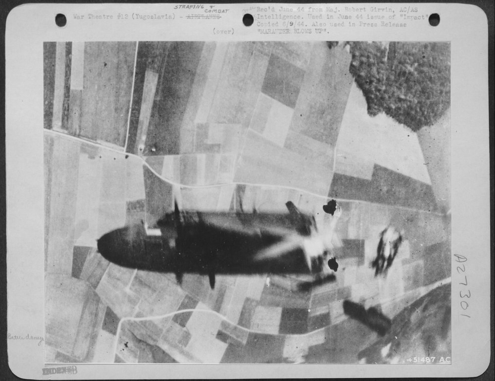 Amazing photo catches a Martin B-26 a split second after flak has