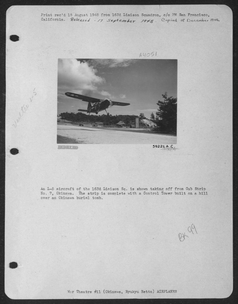 An L-5 aircraft of the 163rd Liaison Sq. is shown taking off from Cub
