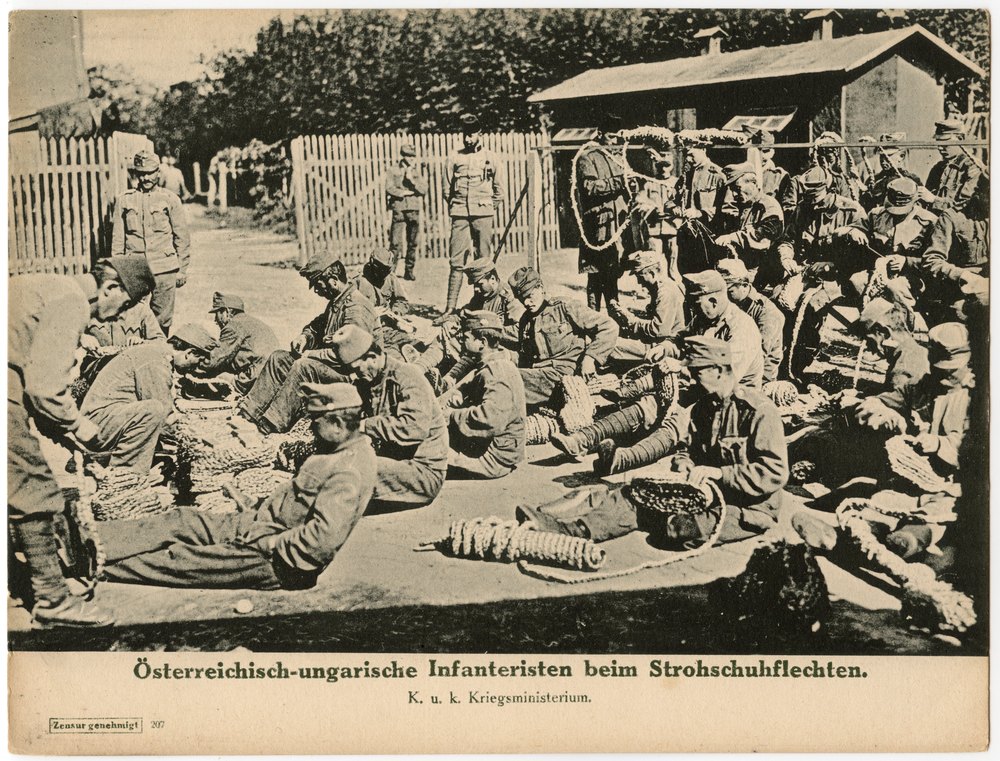 Austro-Hungarian infantrymen weaving straw shoes