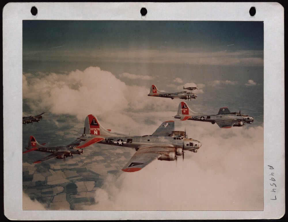B-17 Flying Fortress escorted by P-51 Mustang