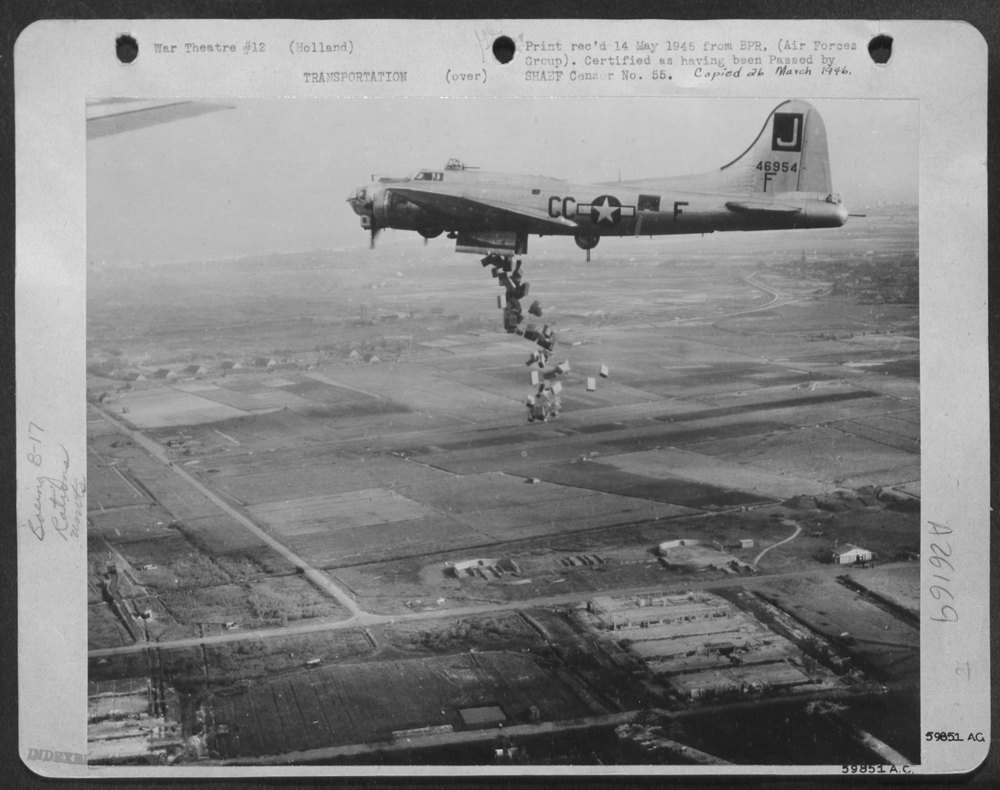 B-17 Flying Fortress over Dutch population