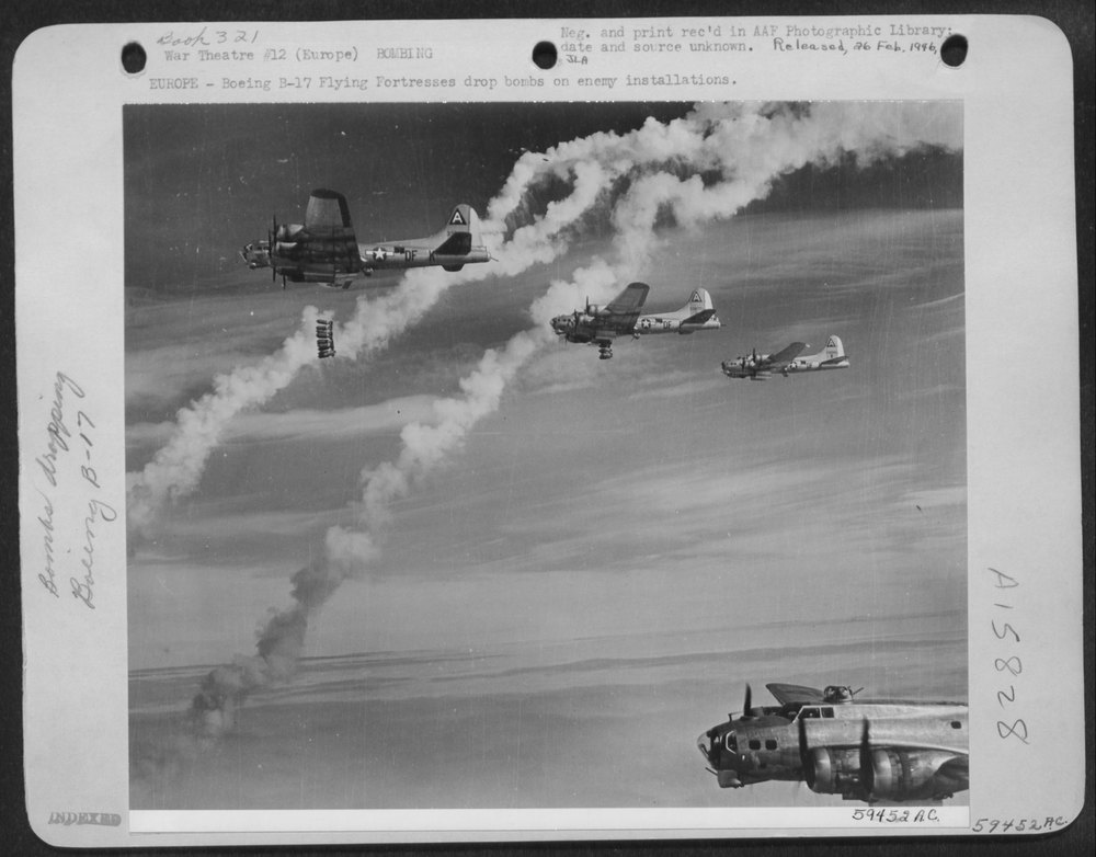 B-17 Flying Fortresses Drop Bombs On Enemy Installations Europe