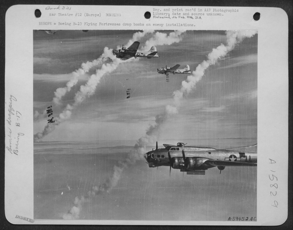 B-17 Flying Fortresses Drop Bombs On Enemy Installations Europe