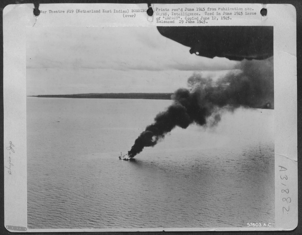 B-24 circles tanker in Makassar straits