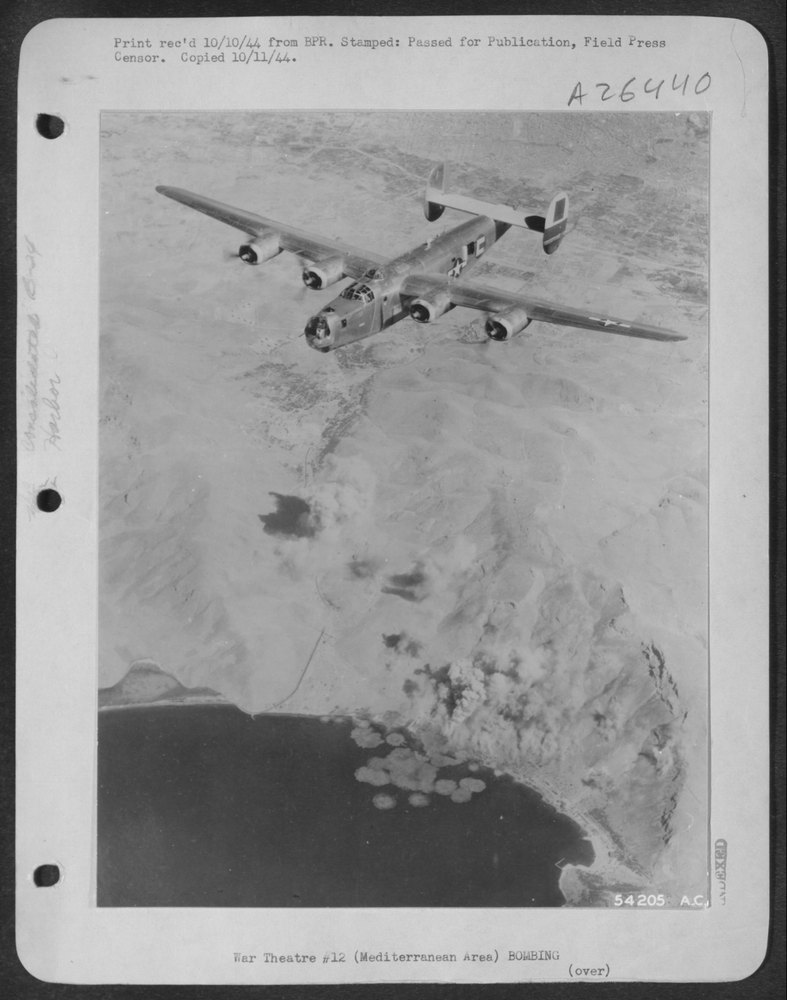 B-24 Liberator over Scaramanga harbor