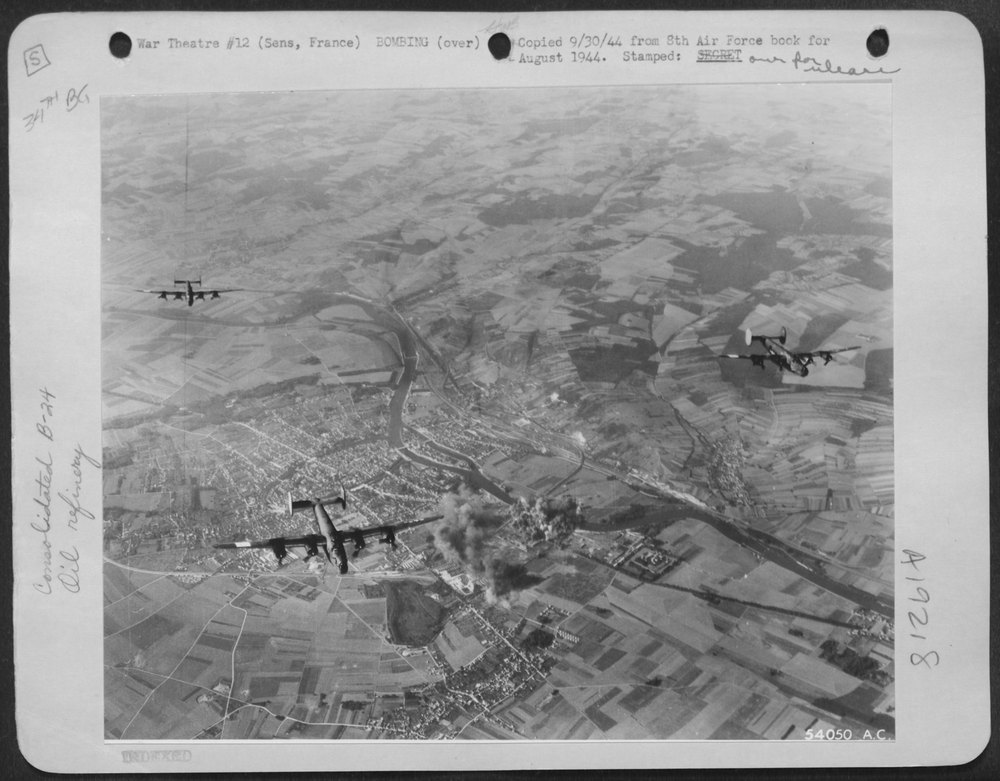 B-24 Liberators attack oil depot at Sens