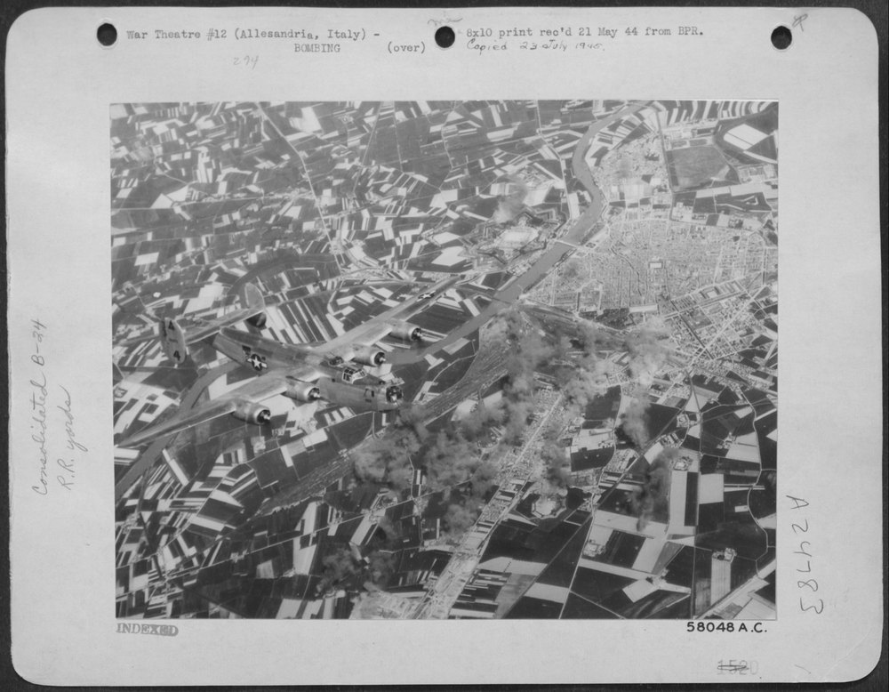 B-24 Liberators hit rail yards near Milan