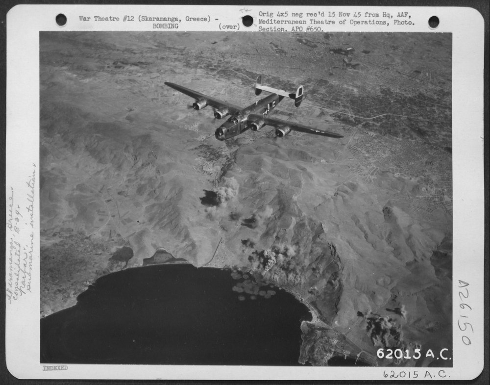 B-24 Liberators over Mediterranean harbor