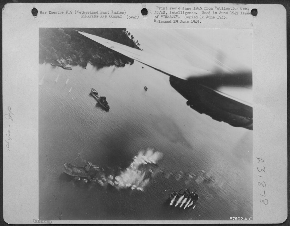 B-24 Liberators strafe Japanese ships