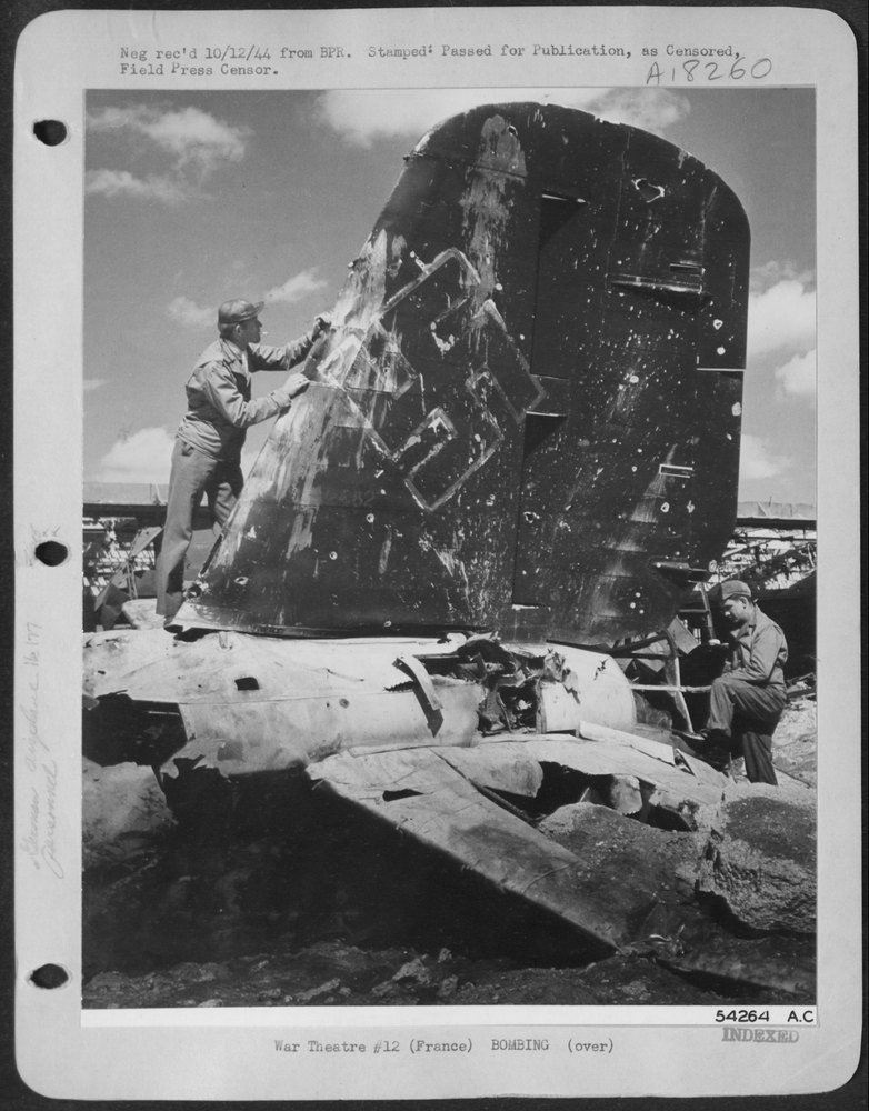 B-24 over French airfield