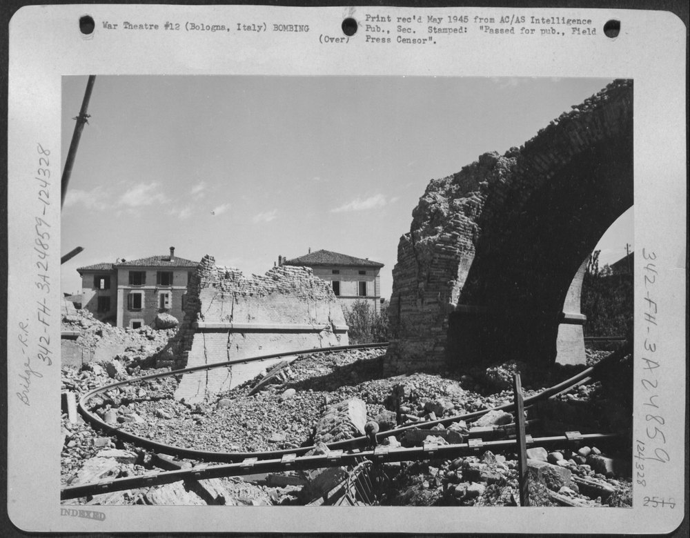 B-25 Mitchells blast bridge in Bologna