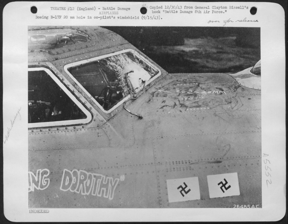 Boeing B-17F 20 mm hole in co-pilot's windshield