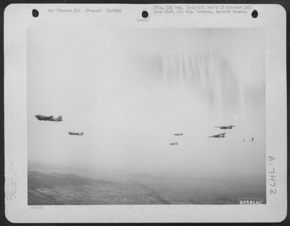 C-47s towing gliders in France
