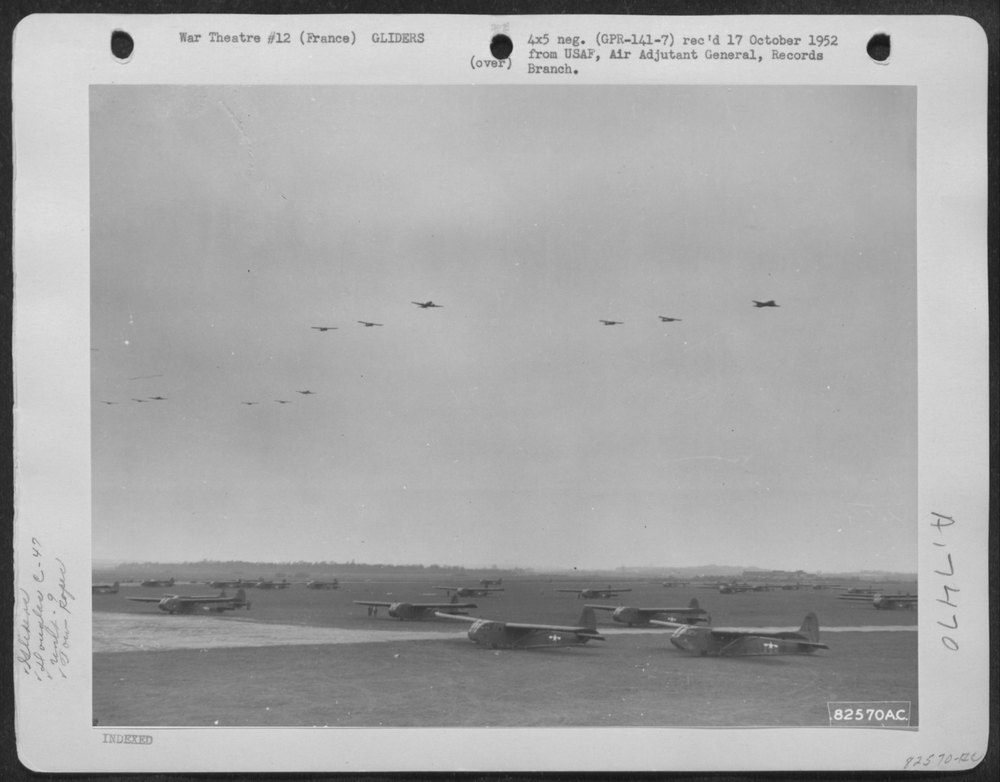 C-47S towing gliders over France