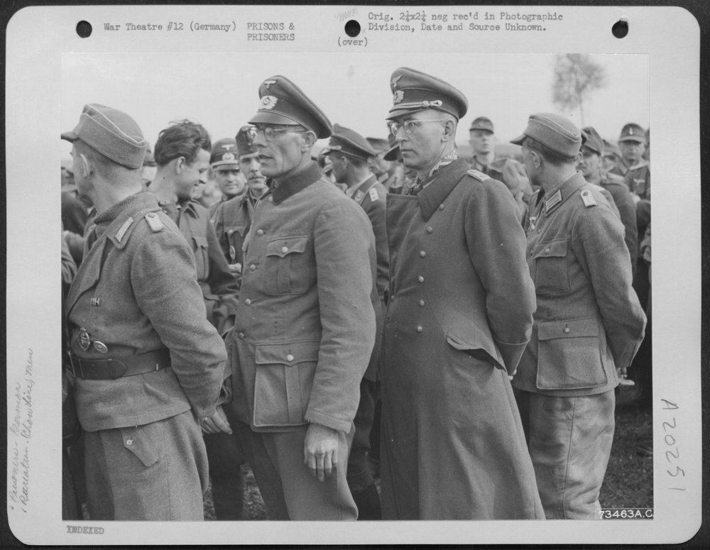Captured German Officers Standing in Line Waiting for 'C' Rations