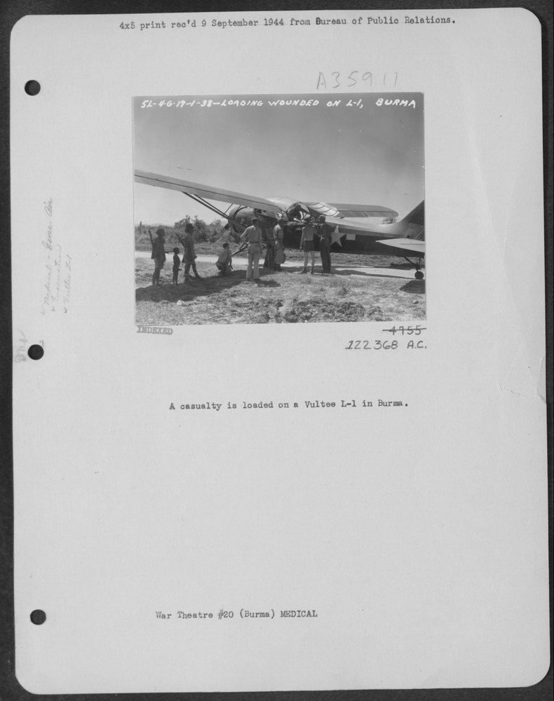 Casualty loaded on Vultee L-1 in Burma