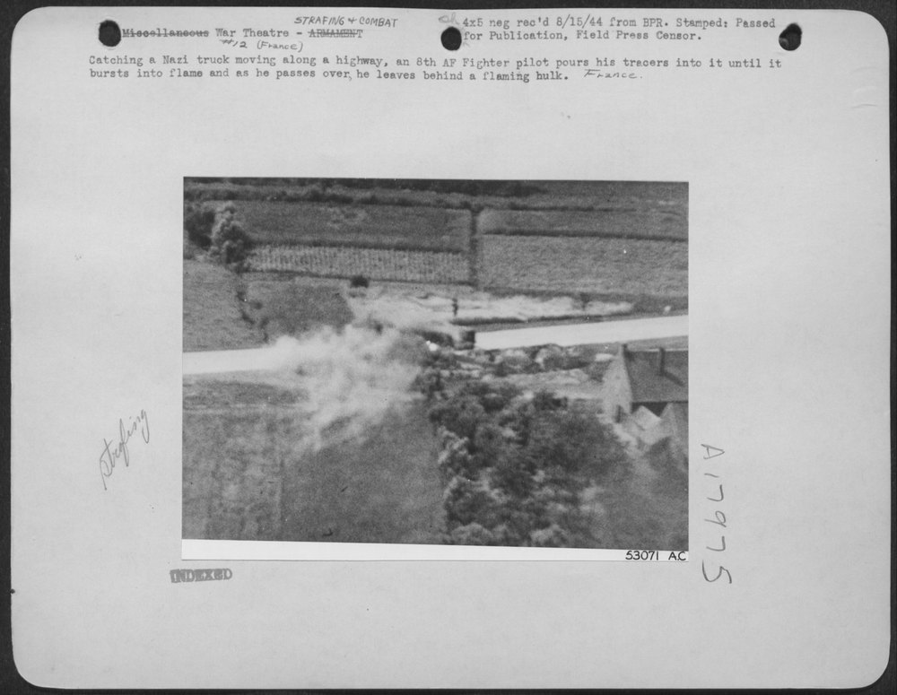 Catching a Nazi truck moving along a highway, an 8th AF Fighter pilot