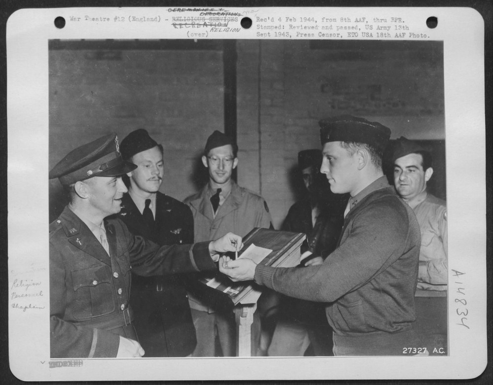 Chaplain Smith distributes Mezuzahs