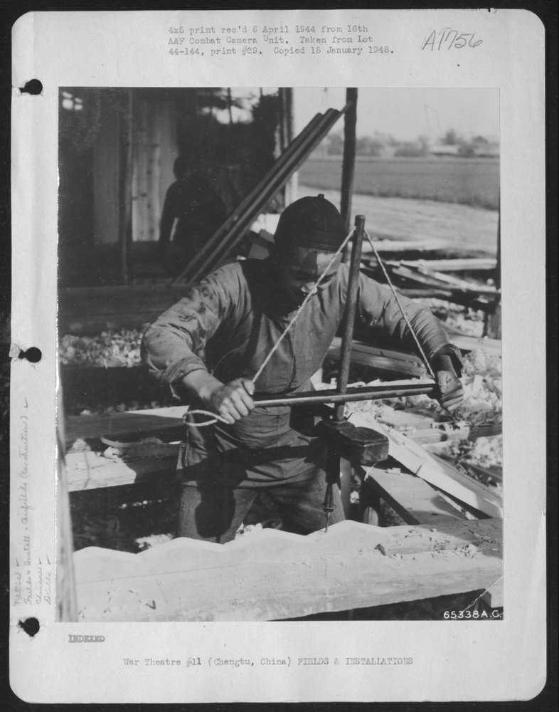 Chinese Coolie At Hsinching Airfield