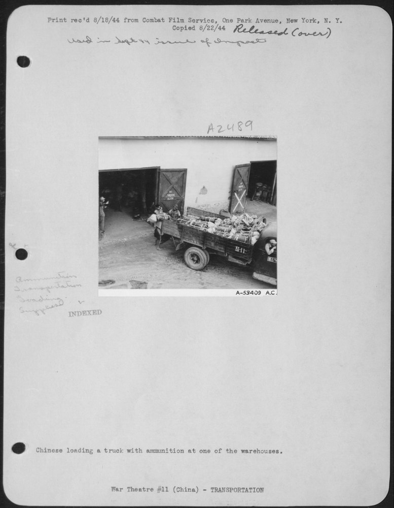 Chinese load ammunition at warehouse