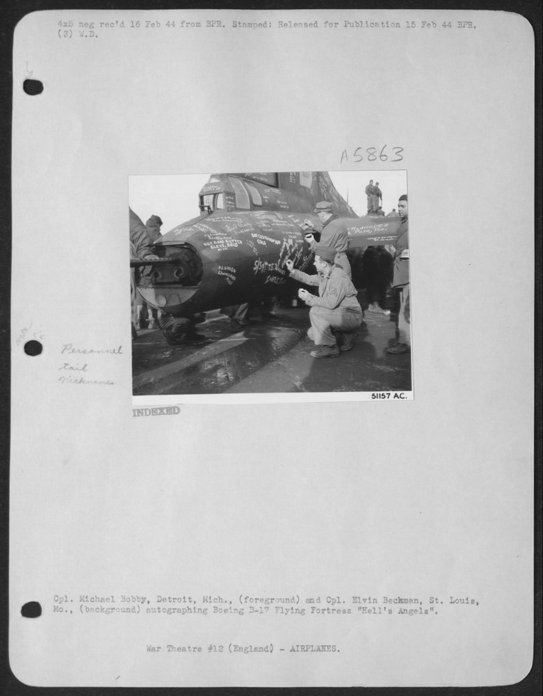 Cpl. Michael Bobby, Detroit, Mich., (foreground) and Cpl. Elvin