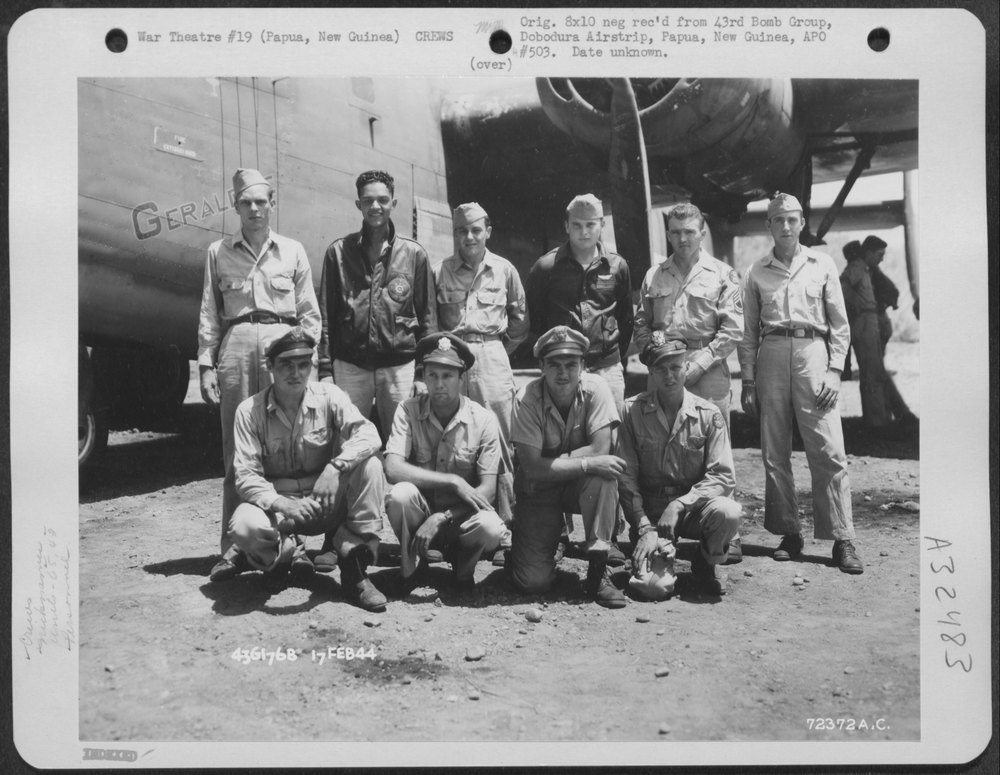 Crew beside B-24 Geraldine at Dobodura
