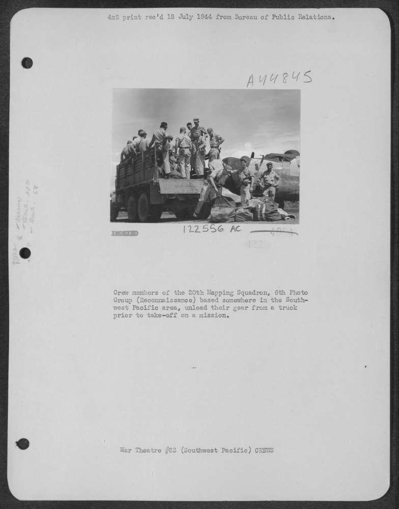 Crew Unload Gear In Southwest Pacific