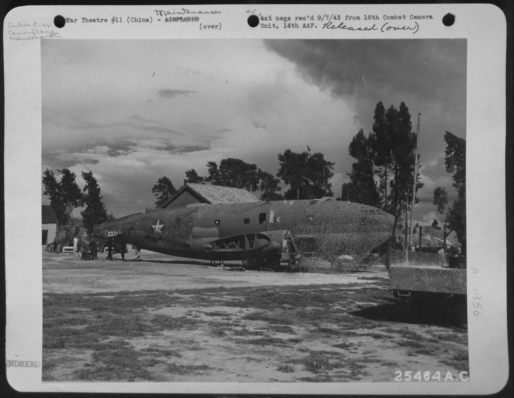 Curtiss C-46 damaged in landing being dismantled to be used for spare