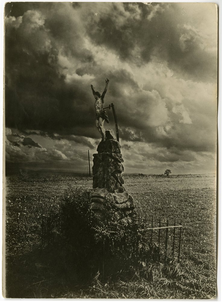 Damaged stone crucifix near Saarburg