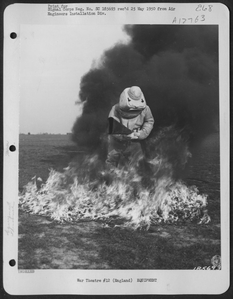 Demonstrating the Use of an Asbestos Suit Which Permits a Soldier