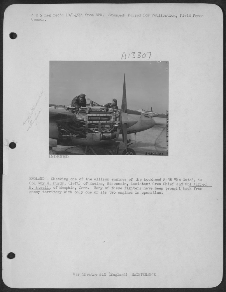 England-Checking one of the Allison engines of the Lockheed P-38 "No